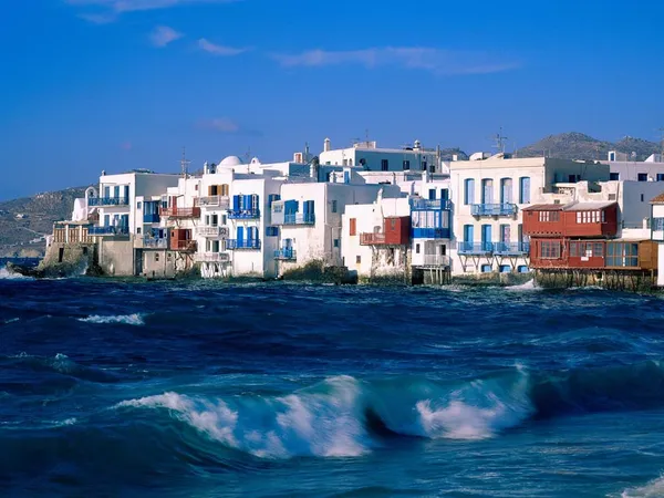 Greek Islands with white buildings and blue sea