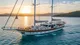 Luxury yacht sailing in the Eastern Mediterranean with scenic coastline